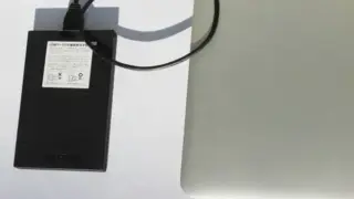 6975